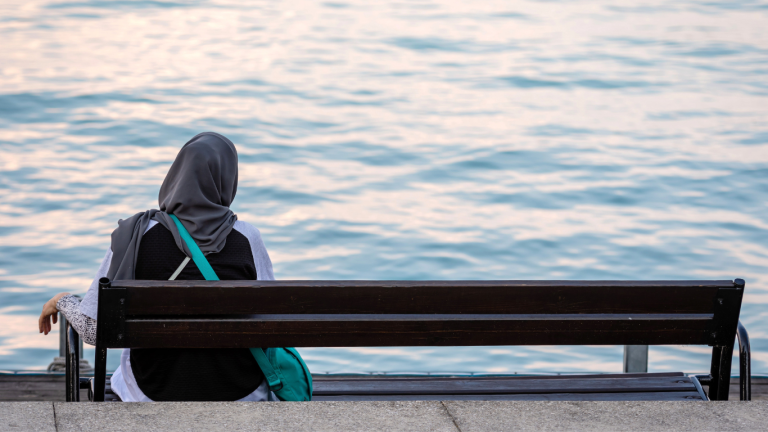 Myths about grief woman bench water