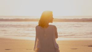 start living woman at beach