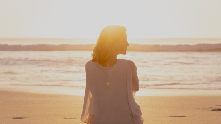 start living woman at beach